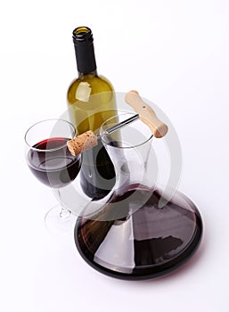 Decanter, bottle and glass with red wine top view