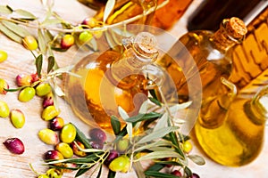 Decanters and bottles with olive oil photo