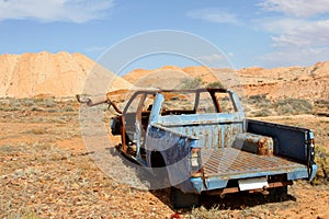 Decayed car wreck in the desert, South Australia
