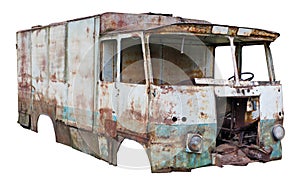 Decayed rusty nameless car van for transportation of agricultural products and bread thrown in the forest front view isolated