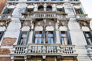 The decaying facade of the building