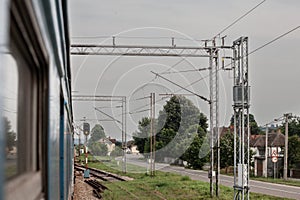 Decaying railway infrastructure seen from the window of an Electric suburban train, an EMU of Beovoz BG Voz service on a train, photo