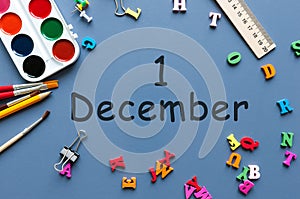 December 1st. Day 1 of december month. Calendar on businessman or schoolchild workplace background. Winter time