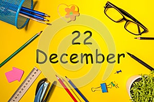December 22nd. Day 22 of december month. Calendar on yellow businessman workplace background. Winter time