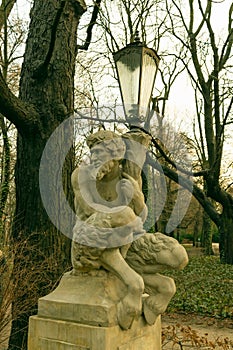 December 26, 2022. Poland Warsaw. Royal Baths Park. Sculpture of a satyr with a lantern