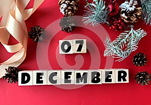 December 7 on wooden cubes. Calendar for December.