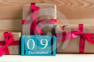 December 9. Blue cube calendar with month and date