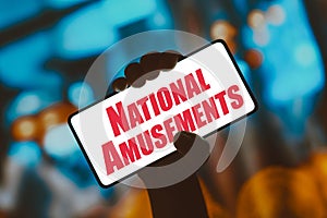 December 9, 2023, Brazil. In this photo illustration, the National Amusements logo is displayed on a smartphone screen
