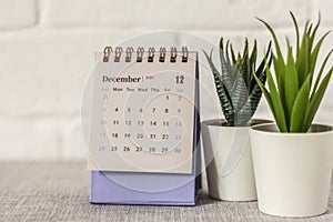 December calendar 2023 on the background of a wooden table.Planning for every day