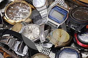 22 December 2023: Close up photos of used watches being sold on the side of the road, Antique watches, clocks