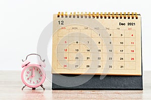 December 2021 Desk calendar with pink alarm clock