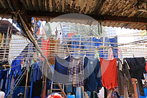 December 21 2022 - Mumbai, Maharashtra, India: People washing clothes in Dhobi Ghat Laundry District, a well known open air