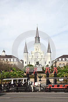 December 13, 2018, New Orleans, Louisiana. Horse And Buggies Wait For Passengers In Front Of Saint Louis Cathedral At Christmas