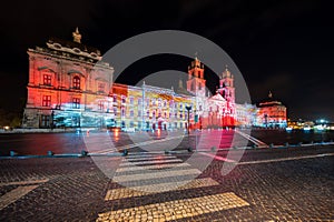 December night with Christmas lights in the National Palace of Mafra in Mafra village near Lisbon. Convent and Basilica of Portuga