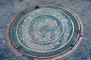 December 7, 2017 San Jose / California / USA: Close up of a City of San Jose Manhole Cover on the sidewalk in the downtown area