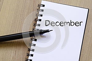 December text concept on notebook