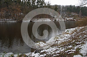 December. The water surface of the winter river