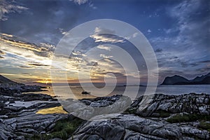 Decending sun. A midnight scene from Flakstad island, Lofoten