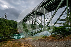 Deception Pass bridge from underneath salish sea ocean