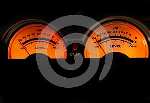decibel meter of an orange illuminated sound amplifier