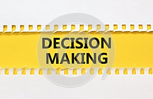 Decision making symbol. Concept words Decision making on yellow paper. Beautiful white background. Business and decision making