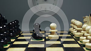 Decision time. Chess pawn makes it's first step. Photo of chess