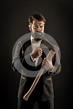 Decision was made. Man brutal hipster with axe. Sharp ax hand confident guy. Masculinity and brutality. Barbershop photo