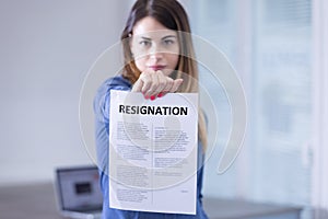 Decisive professional move, woman presents resignation