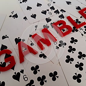 Deck of cards with Gamble as red text
