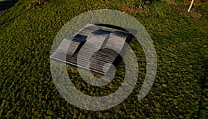 deck chair composed of three waves which are made of wood and board.