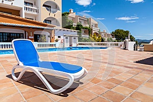 Deck Chair in a Swimming Pool