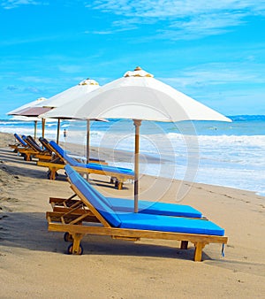 Deck chairs beach parasols, Bali