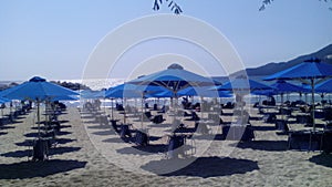 Deck chairs and beach umbrellas