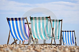 Deck chairs on Brighton beach photo