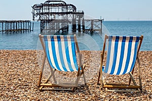 Deck Chairs on Brighton Beach, with a View of the West Pier Behind and a Shallow Depth of Field