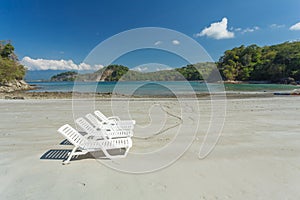 Deck chairs on the Carribean beach in Costa rica