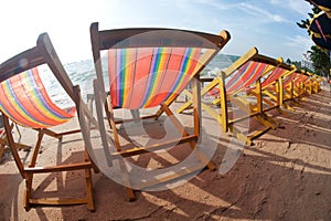 Deck chairs on Pattaya beach .