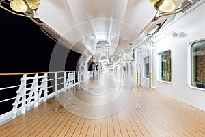 Deck of a cruise ship at night time