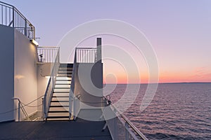Deck of a cruise ship during sunset