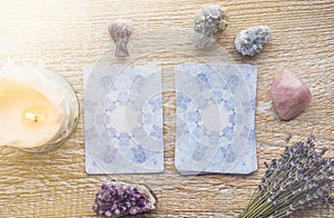 Deck with divination Angel cards on light wooden table.