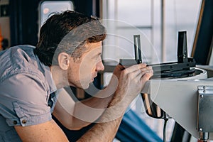 Deck officer taking magnetic compass error onboard of vessel