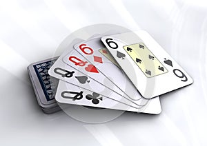 Deck of poker cards revealing full house hand.