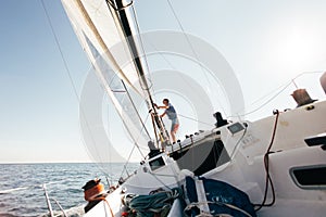 Deck of professional racing yacht leaning in wind