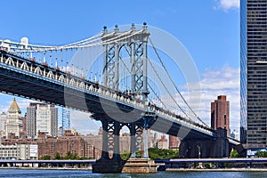 The deck and west tower of the Manhattan bridge with Lower Manhattan in the background