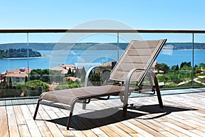 Deckchair on a terrace overlooking Adriatic sea