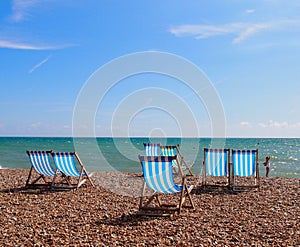 Deckchairs on the beach in Brighton, England