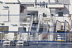 Deckchairs on a tourist cruise. Sumertime recreation relaxing time. Holiday