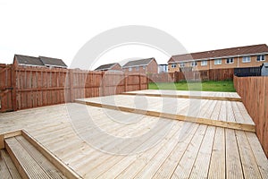 Side view of wooden decking in the garden photo