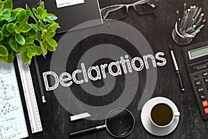 Declarations - Text on Black Chalkboard. 3D Rendering.