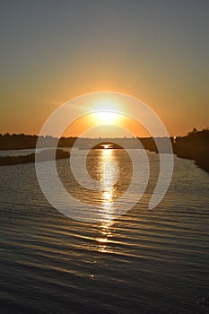 The decline, decline on the small river, after fishing, the sun sets under the horizon, the small river, the small river at sunset